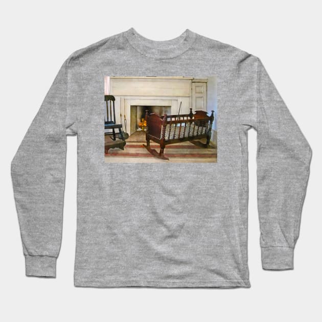 Interiors - Cradle Near Fireplace Long Sleeve T-Shirt by SusanSavad